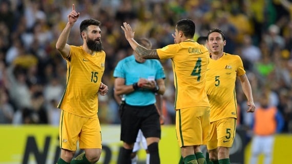 Mile Jedinak and Tim Cahill of Australia