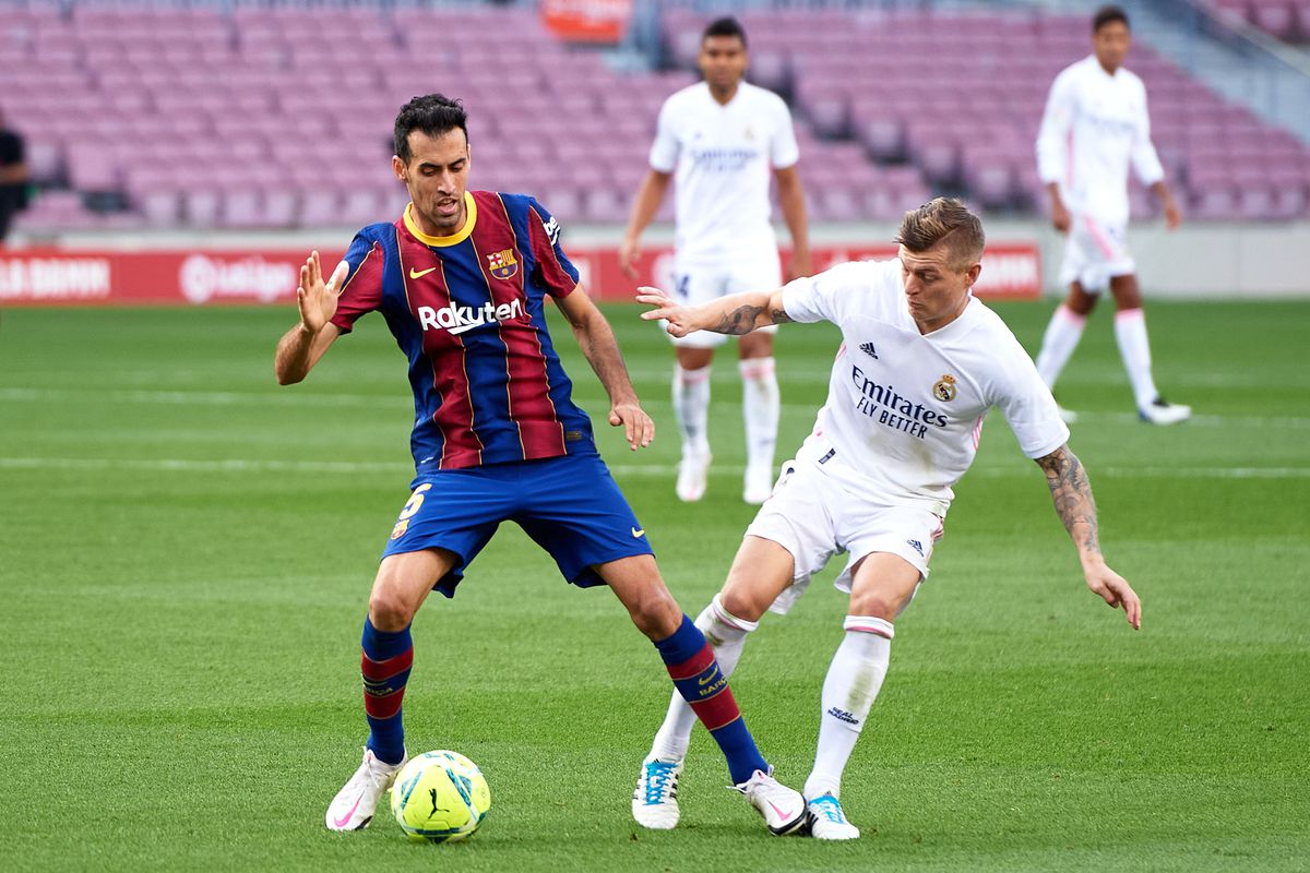 Sergio Busquets and Toni Kroos