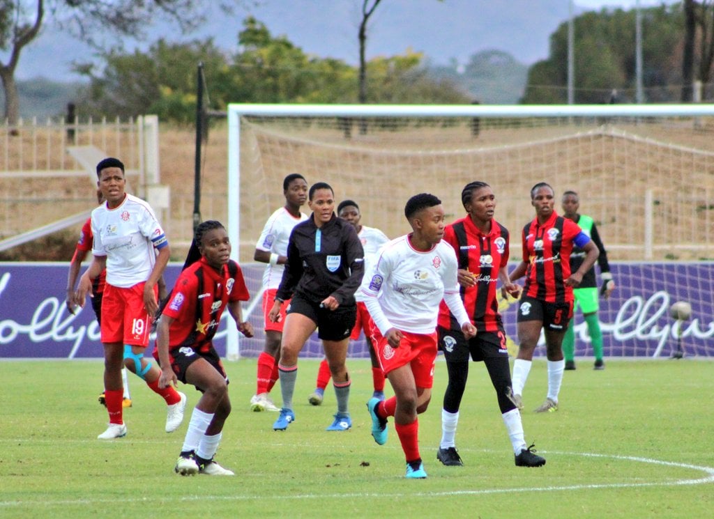 Thunderbirds Ladies and First Touch FC in action