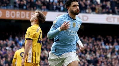 Omar Marmoush of Manchester City celebrates after scoring his team's second goal during the English Premier League soccer match between Manchester City against Brighton & Hove Albion, in Manchester, Britain, 15 March 2025. EPA/ADAM VAUGHAN EDITORIAL USE ONLY. No use with unauthorized audio, video, data, fixture lists, club/league logos, 'live' services or NFTs. Online in-match use limited to 120 images, no video emulation. No use in betting, games or single club/league/player publications.