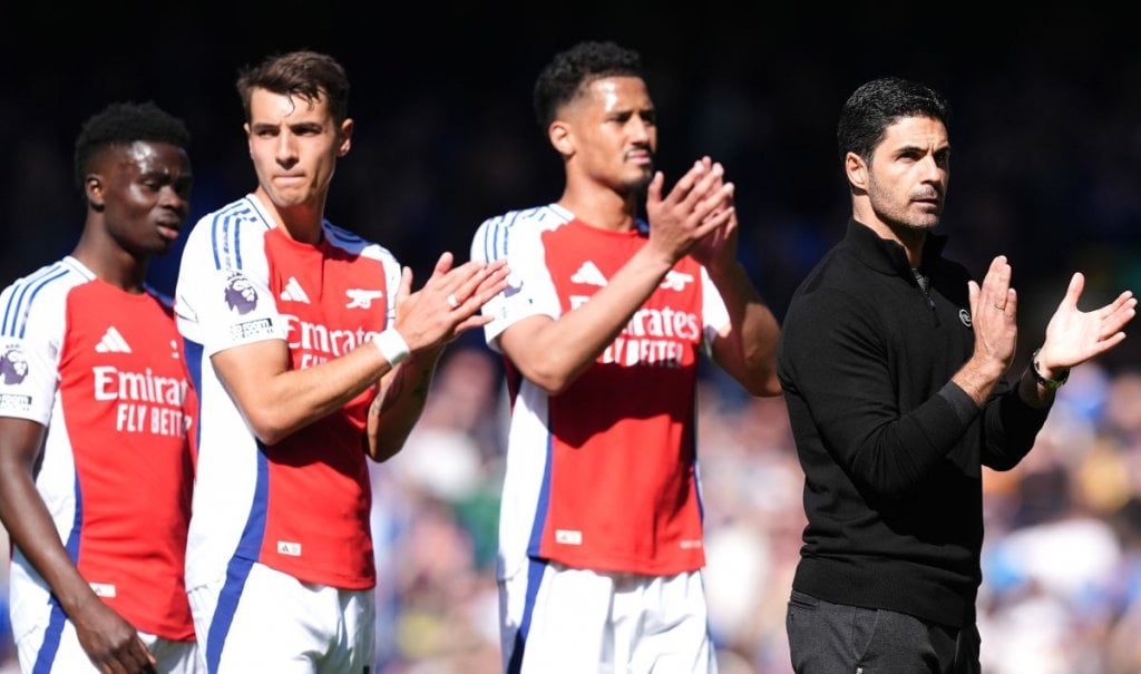 Arsenal manager Mikel Arteta (right) and players applaud the fans after the final whistle in the Premier League match at Goodison Park, Liverpool. Picture date: Saturday April 5, 2025.