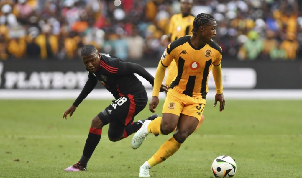 Samkelo Zwane of Kaizer Chiefs tackled by Kabelo Dlamini of Orlando Pirates during the Betway Premiership 2024/25 match between Orlando Pirates and Kaizer Chiefs at FNB Stadium, in Johannesburg on 1 February 2025 ©Phakamisa Lensman/BackpagePix