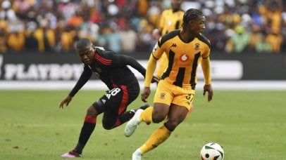Samkelo Zwane of Kaizer Chiefs tackled by Kabelo Dlamini of Orlando Pirates during the Betway Premiership 2024/25 match between Orlando Pirates and Kaizer Chiefs at FNB Stadium, in Johannesburg on 1 February 2025 ©Phakamisa Lensman/BackpagePix