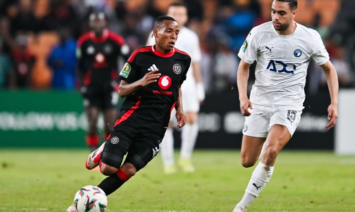 Relebohile Mofokeng of Orlando Pirates challenged by Mohamed Chibi of Pyramids during the CAF Champions League 2024/25 Semi Final 1st Leg match between Orlando Pirates and Pyramids FC at FNB Stadium in Johannesburg, South Africa on 19 April 2025 ©/BackpagePix