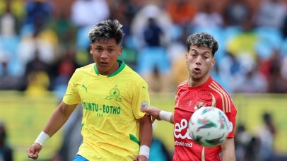 Emam Ashour of Al Ahly challenges Marcelo Allende of Mamelodi Sundowns during the CAF Champions League 2024/25 match between Mamelodi Sundowns and Al Ahly at the Loftus Versfeld Stadium, Pretoria on the 19 April 2025 ©Muzi Ntombela/BackpagePix