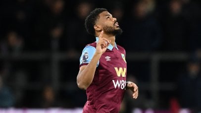 Burnley and Leeds United have been promoted back to the Premier League after both teams secured victories in the English Championship on Monday.