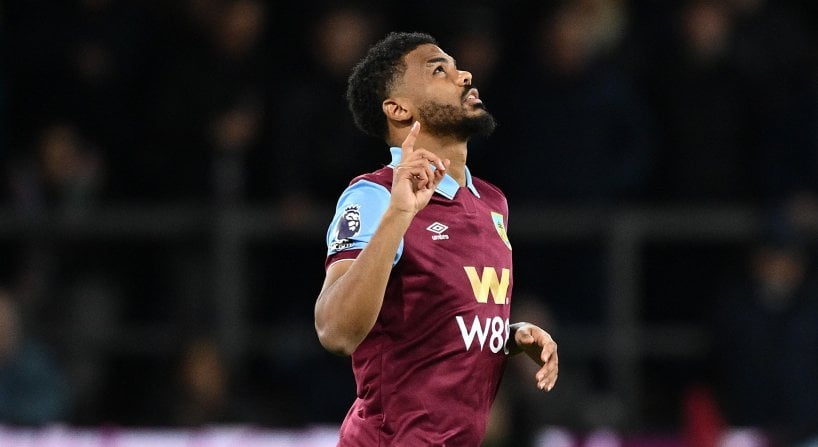 Burnley and Leeds United have been promoted back to the Premier League after both teams secured victories in the English Championship on Monday.