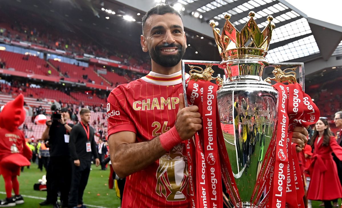 Liverpool player Mohamed Salah celebrates with the Premier League trophy after the English Premier League match between Liverpool and Crystal Palace in Liverpool, Britain, 25 May 2025. EPA/PETER POWELL EDITORIAL USE ONLY. No use with unauthorized audio, video, data, fixture lists, club/league logos, 'live' services or NFTs. Online in-match use limited to 120 images, no video emulation. No use in betting, games or single club/league/player publications.