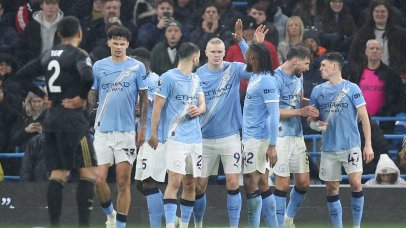 Erling Haaland (C) of Manchester City celebrates scoring the 1-0 goal with team members during the English Premier League match between Manchester City and Fulham FC, in Manchester, Britain, 11 February 2026. EPA/ADAM VAUGHAN EDITORIAL USE ONLY. No use with unauthorized audio, video, data, fixture lists, club/league logos, 'live' services or NFTs. Online in-match use limited to 120 images, no video emulation. No use in betting, games or single club/league/player publications.