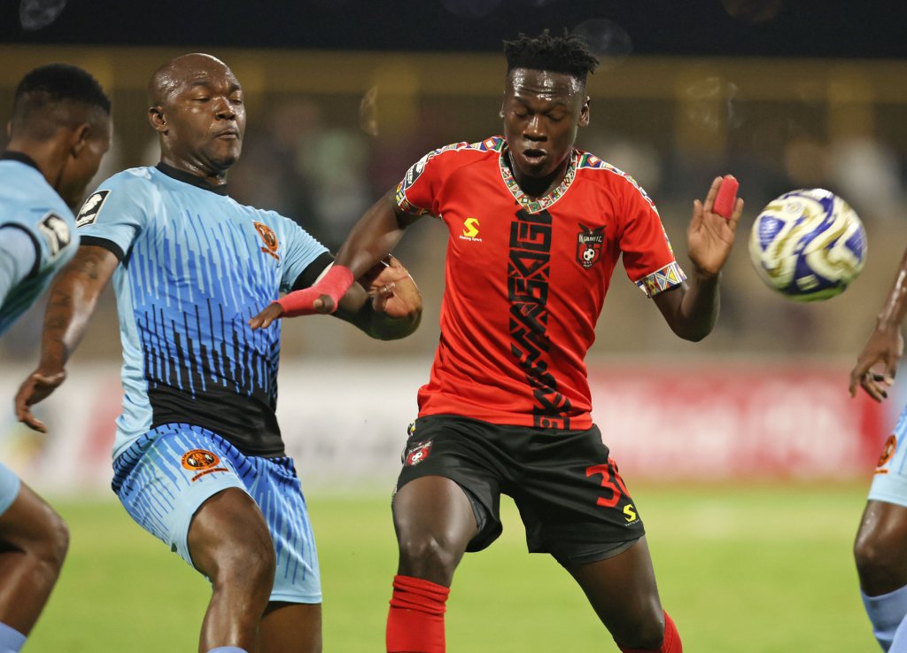 Siphamandla Ngwenya of TS Galaxy challenged by Bulelani Nikani of Polokwane City during the Betway Premiership 2025/26 match between TS Galaxy and Polokwane City at the Solomon Mahlangu Stadium, KwaMhlanga on the 08 April 2026 ©Muzi Ntombela/BackpagePix