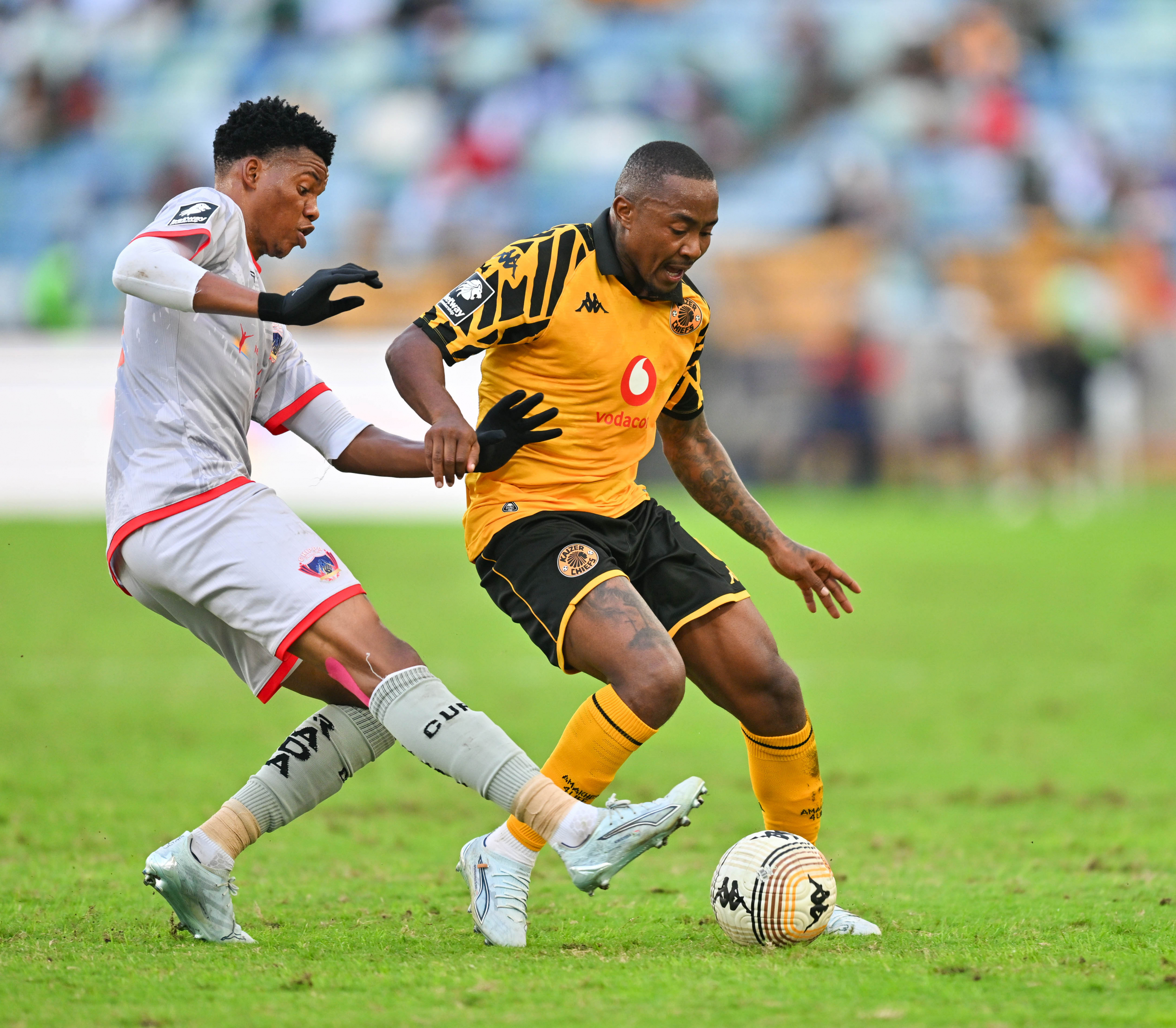 Lebogang Maboe of Kaizer Chiefs challenged by Sinoxolo Kwayiba of Chippa United during the Betway Premiership 2025/26 match between Kaizer Chiefs and Chippa United at Moses Mabhida Stadium in Durban on 23 May 2026 © Alche Greeff/BackpagePix