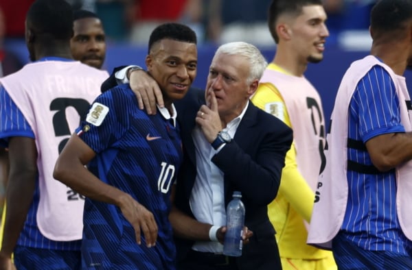 France's head coach Didier Deschamps talks to his player Kylian Mbappe after winning the FIFA World Cup 2026 Round of 16 match Paraguay against France, in Philadelphia, Pennsylvania, USA, 04 July 2026. EPA/WILL OLIVER