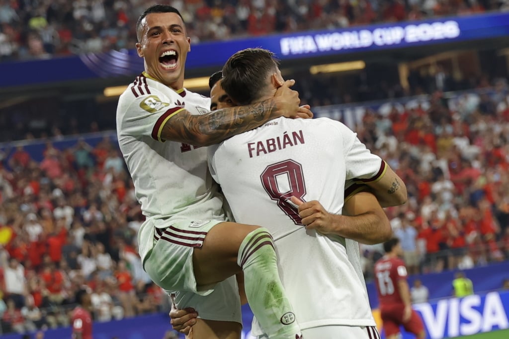 Mikel Merino (R) of Spain celebrates with Fabian Ruiz (C) and Pedro Porro (up) after scoring the 1-0 lead during the FIFA World Cup 2026 Round of 16 match Portugal against Spain, in Dallas, USA, 06 July 2026. EPA/CHRISTOPHER NEUNDORF