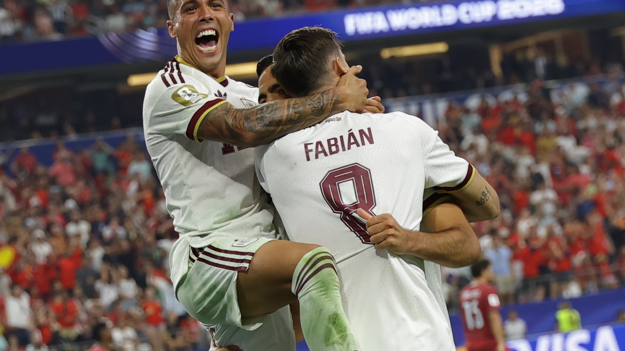 Mikel Merino (R) of Spain celebrates with Fabian Ruiz (C) and Pedro Porro (up) after scoring the 1-0 lead during the FIFA World Cup 2026 Round of 16 match Portugal against Spain, in Dallas, USA, 06 July 2026. EPA/CHRISTOPHER NEUNDORF