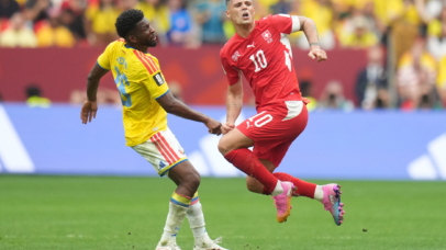 Andres Gomez of Colombia (L) in action against Granit Xhaka of Switzerland (R) during the FIFA World Cup 2026 Round of 16 match Switzerland against Colombia, in Vancouver, Canada, 07 July 2026. EPA/BOB FRID