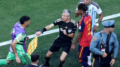 Assistant referee Tomaz Klancnik (C) gets between Lamine Yamal (R) of Spain and a substitute from the Argentinian bench during the FIFA World Cup 2026 final match Spain against Argentina, in New Jersey, USA, 19 July 2026. EPA/RONALD WITTEK