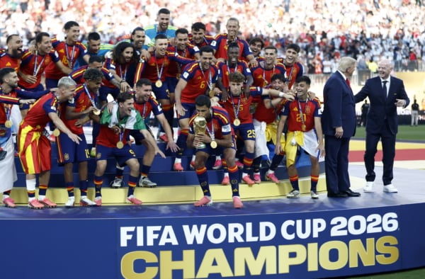 Spain's head coach Luis de la Fuente and his player celebrate with the World Cup Trophy during the awards ceremony after the FIFA World Cup 2026 final match Spain against Argentina, in East Rutherford, New Jersey, USA, 19 July 2026. EPA/WILL OLIVER