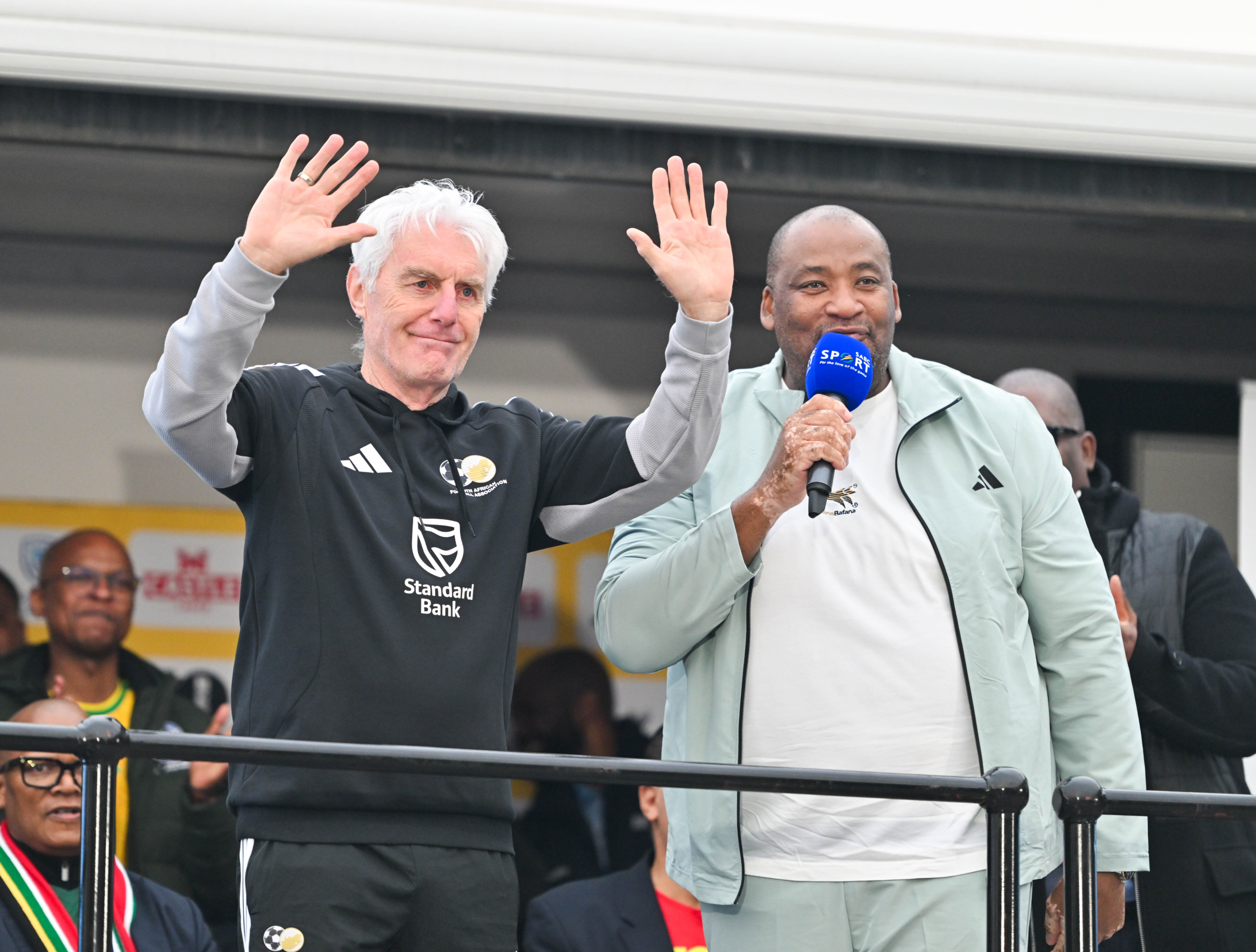 Hugo Broos and Gayton McKenzie during the FIFA World Cup 2026 South Africa Homecoming at OR Tambo International Airport in Johannesburg on 2 July 2026 ©Alche Greeff/BackpagePix