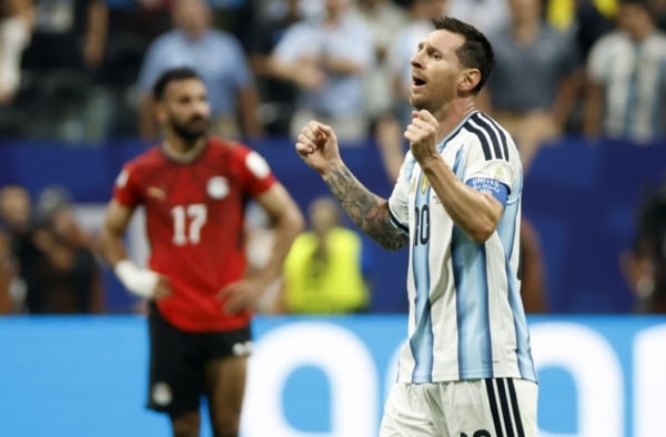 Lionel Messi of Argentina celebrates victory , Mohanad Lashin of Egypt dejected during the FIFA World Cup 2026 Last 16 match between Argentina and Egypt at the Atlanta Stadium, Atlanta, America on 07 July 2026 ©Gavin Barker/BackpagePix