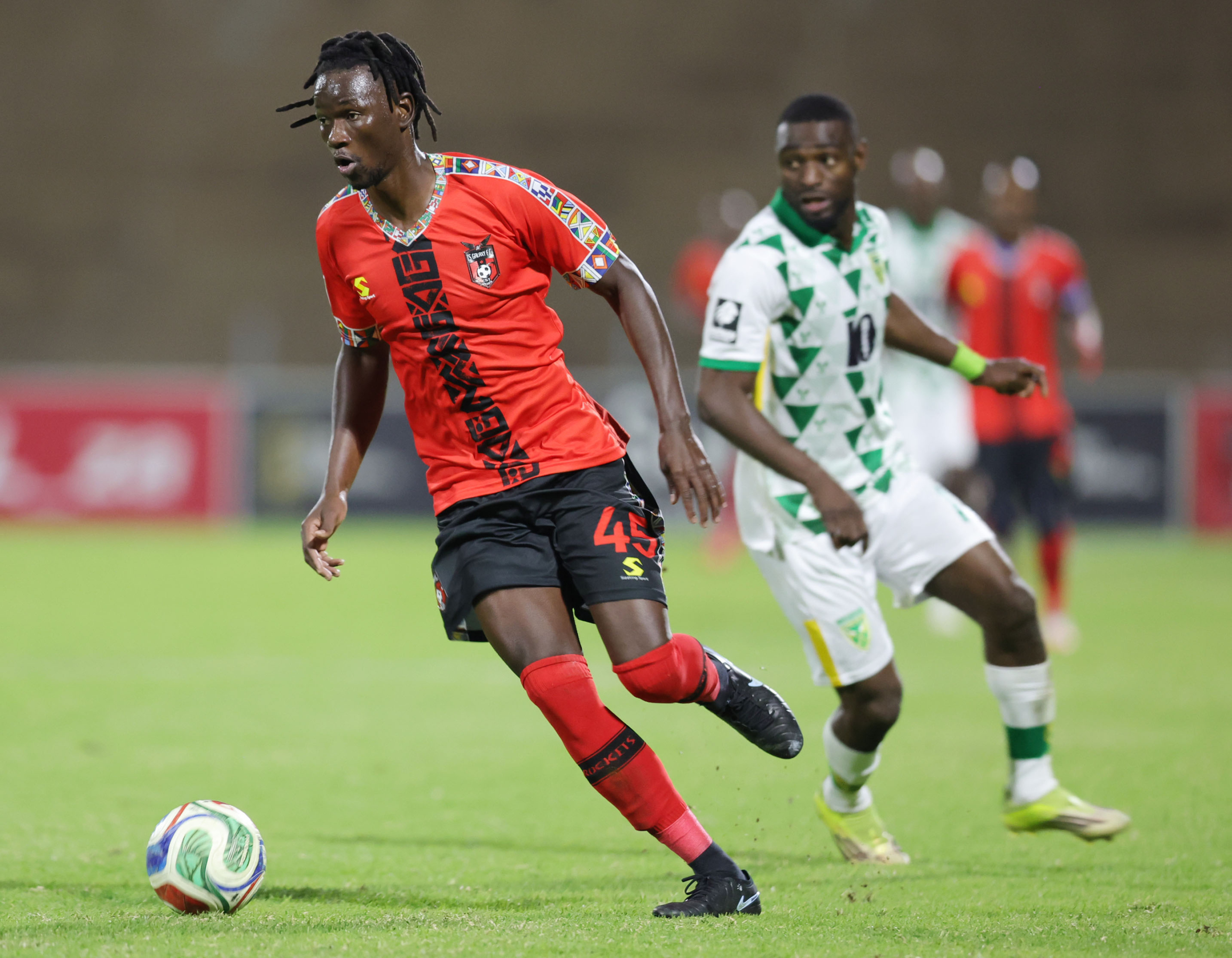 Veluyeke Zulu of TS Galaxy challenged by Junior Dion of Golden Arrows during Betway Premiership 2026/27 match between TS Galaxy and Golden Arrows at Solomon Mahlangu Stadium in Mpumalanga, on 16 August 2026 ©Samuel Shivambu/BackpagePix