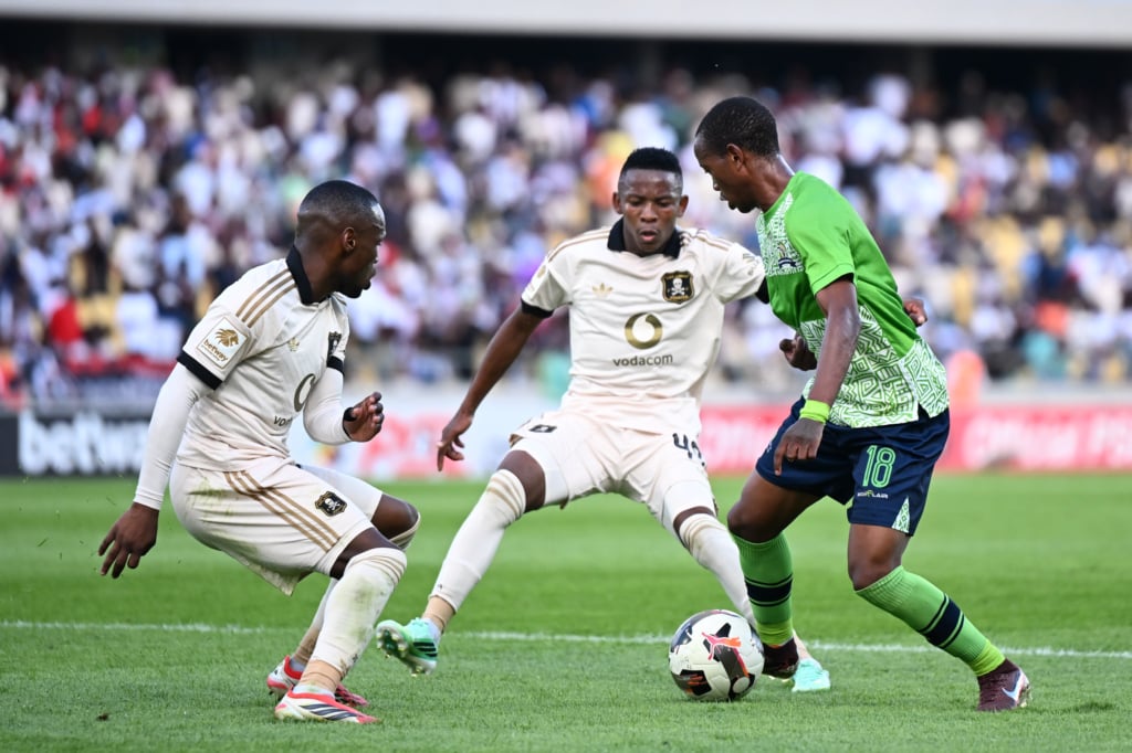 Msindisi Kunene of Marumo Gallants challenged by Kamogelo Sebelebele of Orlando Pirates during the Betway Premiership 2026/27 football match between Marumo Gallants and Orlando Pirates at Royal Bafokeng Stadium in Rustenburg on 20 September 2026 ©Nokwanda Zondi/BackpagePix