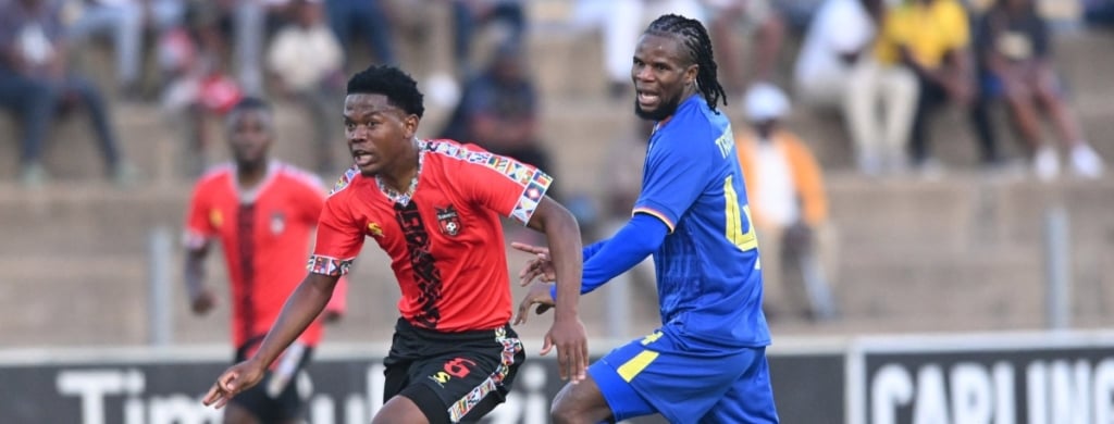 Ntandoyenkosi Nkosi TS Galaxy challenges Tatenda Tavengwa of Kruger United FC during the Betway Premiership 2026/27 match between TS Galaxy FC and Kruger United FC at Solomon Mahlangu Stadium in Kwa Ndebele on 13 September 2026 ©Sydney Mahlangu/BackpagePix