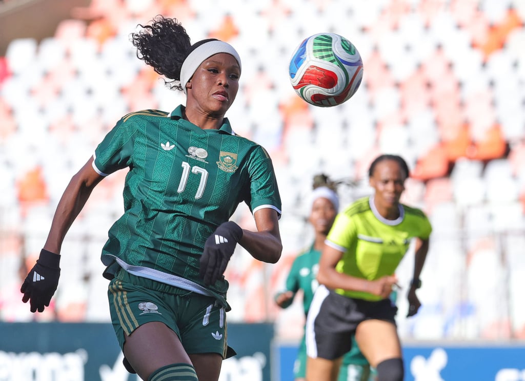 Ronnel Donnelly of South Africa challenged by Verosantatra Diana Adrianandrasana and Miora Lalaina Florence Raherimampionona of Madagascar during the 2028 Los Angeles Olympic Games Qualify match between South Africa and Madagascar at Free State Stadium in Bloemfontein on October 2026 © Samuel Shivambu/BackpagePix