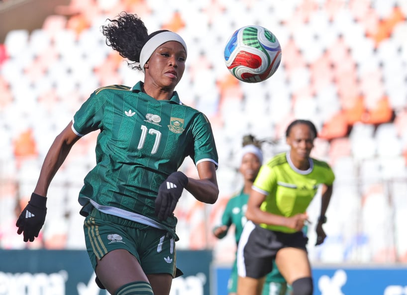 Ronnel Donnelly of South Africa challenged by Verosantatra Diana Adrianandrasana and Miora Lalaina Florence Raherimampionona of Madagascar during the 2028 Los Angeles Olympic Games Qualify match between South Africa and Madagascar at Free State Stadium in Bloemfontein on October 2026 © Samuel Shivambu/BackpagePix