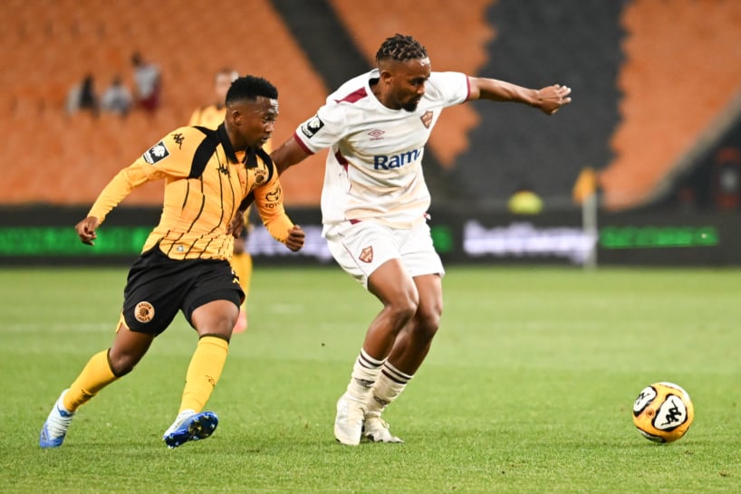 Mduduzi Shabalala of Kaizer Chiefs challenged by Njabulo Blom of Stellenbosch FC during the Betway Premiership 2026/27 football match between Kaizer Chiefs and Stellenbosch FC at the FNB Stadium in Johannesburg on 13 October 2026 ©Nokwanda Zondi/BackpagePix