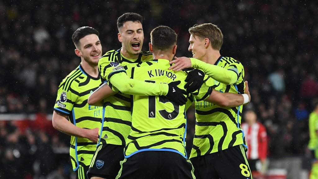 Arsenal moved back to within two points of the Premier League summit with a ruthless 6-0 win away to shambolic Sheffield United on Monday night.