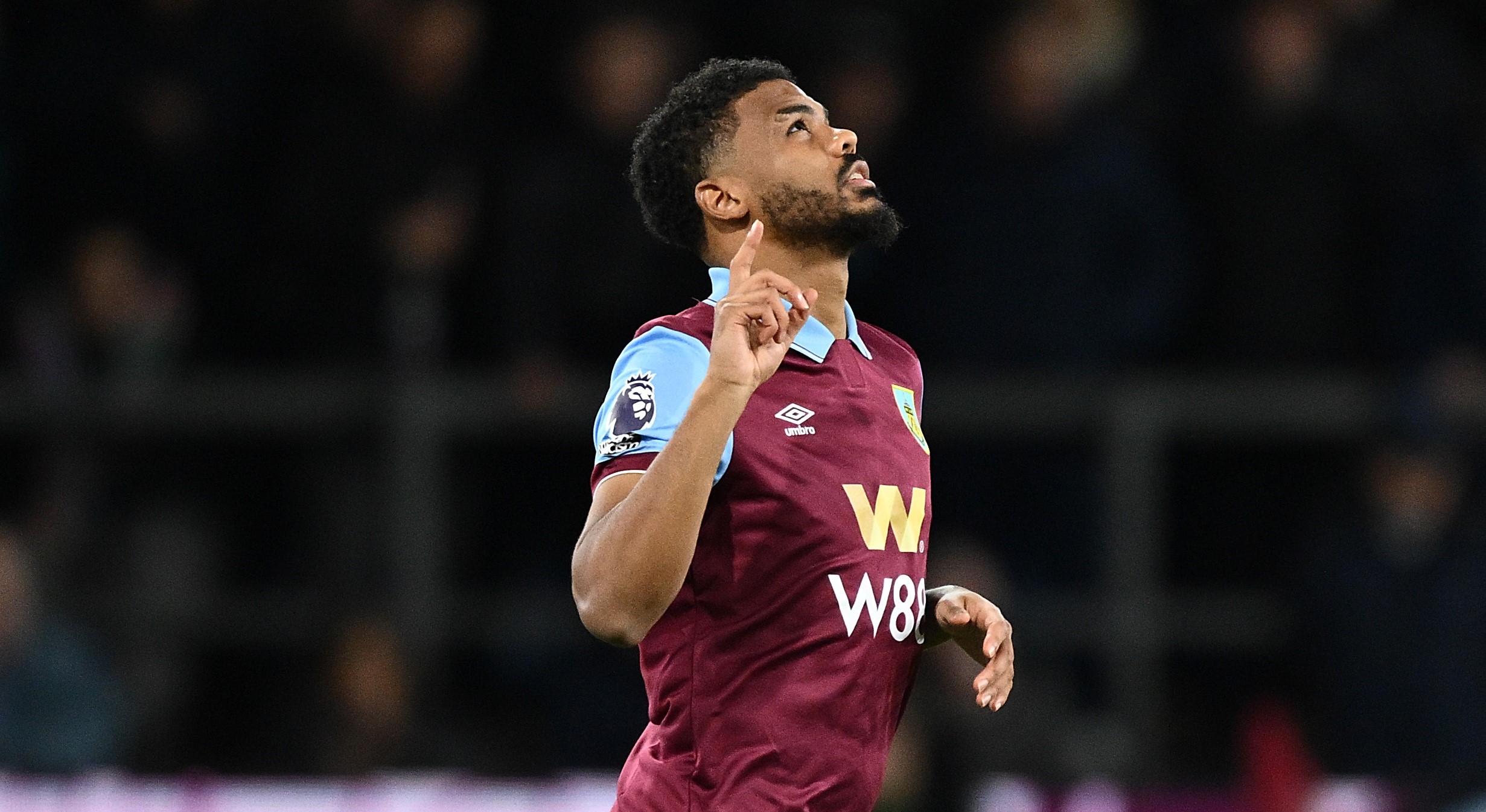 Burnley and Leeds United have been promoted back to the Premier League after both teams secured victories in the English Championship on Monday.