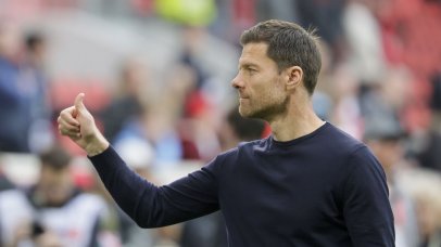 Head coach Xabi Alonso of Leverkusen reacts before the German Bundesliga soccer match between SC Freiburg and Bayer 04 Leverkusen in Freiburg, Germany, 04 May 2025. EPA/RONALD WITTEK CONDITIONS - ATTENTION: The DFL regulations prohibit any use of photographs as image sequences and/or quasi-video.