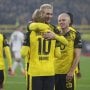 Dortmund sweep aside Bremen 3-0 to stay in title race