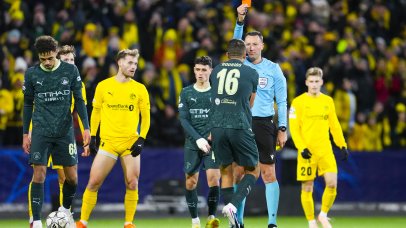 Referee Sven Jablonski shows a red card to Manchester City's Rodrigo Hernandez Cascante during the UEFA Champions League soccer match between Bodo/Glimt and Manchester City at Aspmyra Stadium in Bodo, Norway, 20 January 2026. EPA/Fredrik Varfjell NORWAY OUT