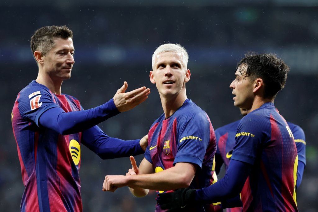 Barcelona's Dani Olmo (C) celebrates his goal with teammates during the Spanish LaLiga soccer match between RCD Espanyol and FC Barcelona in Barcelona, Spain, 03 January 2026. EPA/Andreu Dalmau