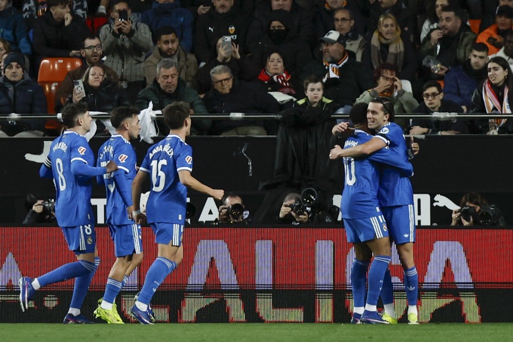 Real Madrid's Alvaro Carreras celebrates with teammates after scoring against Valencia during the Spanish LaLiga soccer match between Valencia CF and Real Madrid at the Mestalla Stadium, in Valencia, Spain, 08 February 2026. EPA/BIEL ALINO