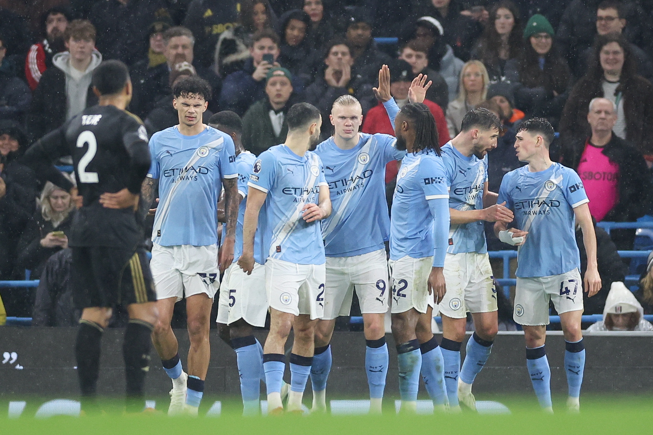 Erling Haaland (C) of Manchester City celebrates scoring the 1-0 goal with team members during the English Premier League match between Manchester City and Fulham FC, in Manchester, Britain, 11 February 2026. EPA/ADAM VAUGHAN EDITORIAL USE ONLY. No use with unauthorized audio, video, data, fixture lists, club/league logos, 'live' services or NFTs. Online in-match use limited to 120 images, no video emulation. No use in betting, games or single club/league/player publications.