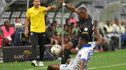 Tshegofatso Mabasa of Stellenbosch FC is fouled by Khalid Iddi of Singida Black Stars during the CAF Confederation Cup 2025/26 game between Stellenbosch FC and Singida Black Stars at Cape Town Stadium in Cape Town on 15 February 2026 © Ryan Wilkisky/BackpagePix