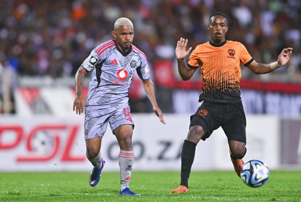 Oswin Appolis of Orlando Pirates challenged by Tlou Nkwe of Polokwane City during the Betway Premiership 2025/26 match between Polokwane City and Orlando Pirates at Old Peter Mokaba Stadium in Polokwane on 4 March 2026 ©Alche Greeff/BackpagePix