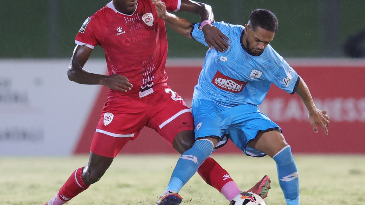 Haashim Domingo of Durban City challenged by Vuyo Letlapa of Sekhukhune United during the Betway Premiership 2025/26 match between Durban City and Sekhukhune United at Chatsworth Stadium in Durban on 04 March 2026 ©Samuel ShivambuBackpagePix