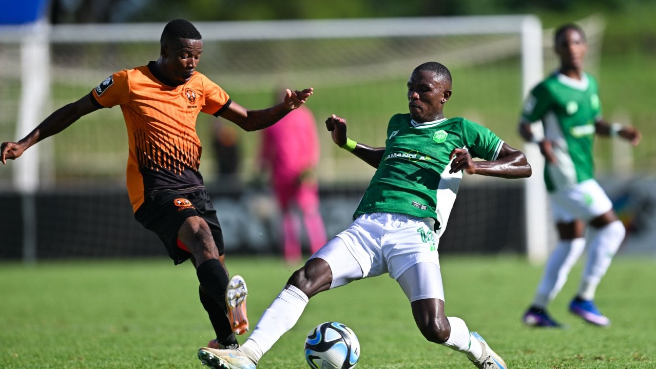 Bonginkosi Dlamini of Polokwane City fouled by Nkosikhona Radebe of AmaZulu during the Betway Premiership 2025/26 match between Polokwane City and Amazulu at Old Peter Mokaba Stadium in Polokwane on 21 March 2026 ©Alche Greeff/BackpagePix