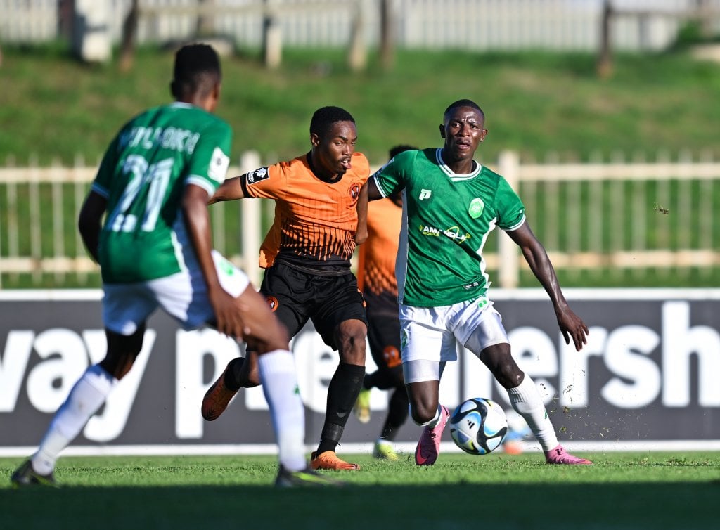 Nkosikhona Radebe of AmaZulu challenged by Tlou Nkwe of Polokwane City during the Betway Premiership 2025/26 match between Polokwane City and Amazulu at Old Peter Mokaba Stadium in Polokwane on 21 March 2026 ©Alche Greeff/BackpagePix
