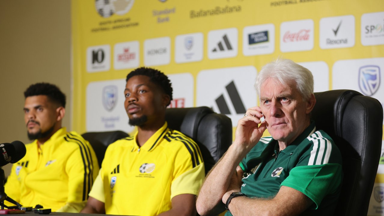Renaldo Leaner, Ime Okon of South Africa and Hugo Broos, coach of South Africa during the Bafana Bafana press conference at Southern Sun Hotel in Pretoria on 23 March 2026 ©Samuel ShivambuBackpagePix