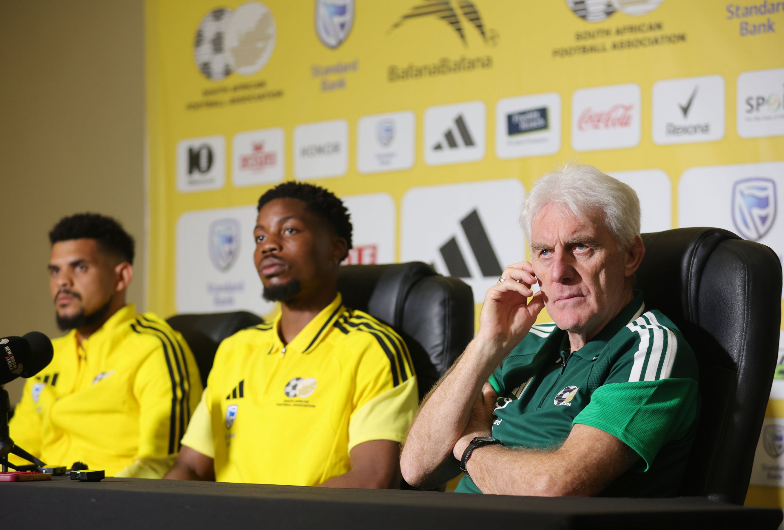 Renaldo Leaner, Ime Okon of South Africa and Hugo Broos, coach of South Africa during the Bafana Bafana press conference at Southern Sun Hotel in Pretoria on 23 March 2026 ©Samuel ShivambuBackpagePix