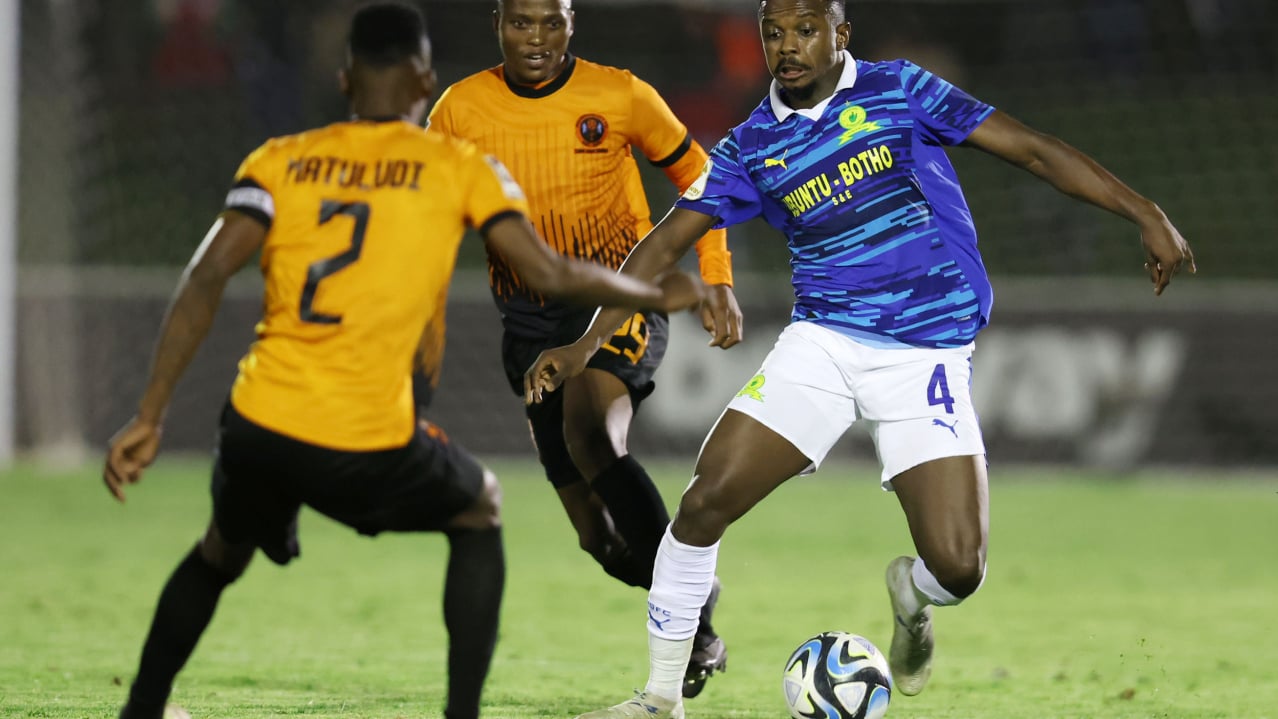 Tebogo Mokoena of Mamelodi Sundowns challenged by Thabang Matuludi and Sibusiso Tshabalala of Polokwane City during the Betway Premiership 2025/26 match between Polokwane City and Mamelodi Sundowns at Seshego Stadium, Seshego on the 29 April 2026 ©Muzi Ntombela/BackpagePix