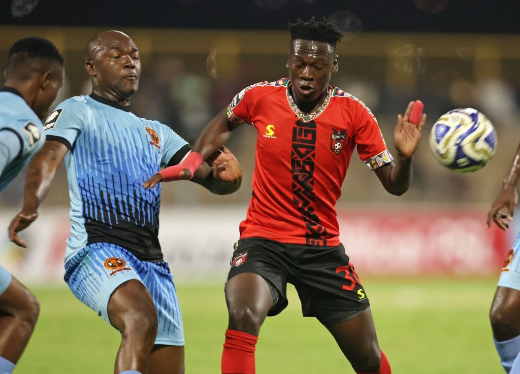 Siphamandla Ngwenya of TS Galaxy challenged by Bulelani Nikani of Polokwane City during the Betway Premiership 2025/26 match between TS Galaxy and Polokwane City at the Solomon Mahlangu Stadium, KwaMhlanga on the 08 April 2026 ©Muzi Ntombela/BackpagePix